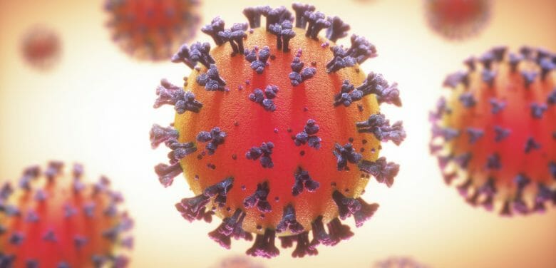 Imagem conceitual do novo coronavírus, ilustrando que o teste de covid-19 será obrigatório para embarcar do exterior para o Brasil.