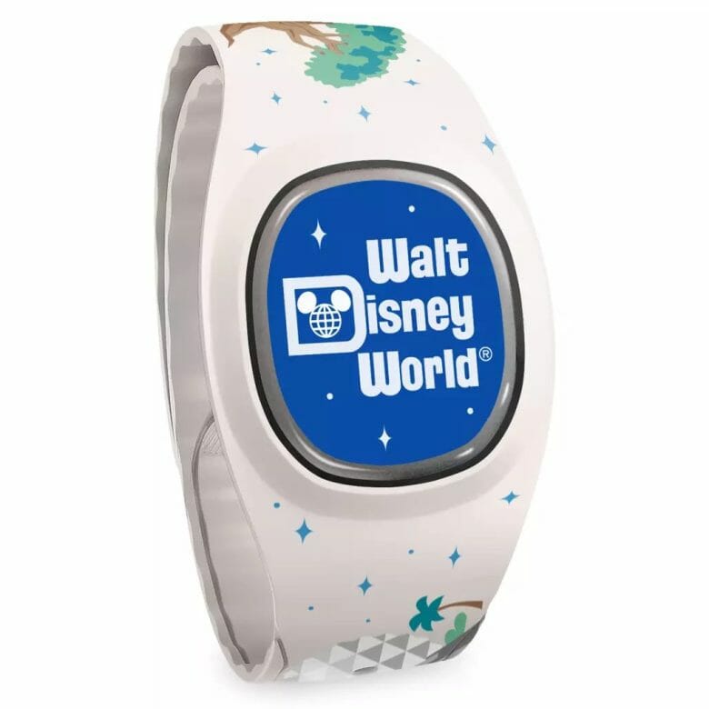 Foto de uma MagicBand+, branca, com ícones dos quatro parques e um círculo azul no meio com o texto Walt Disney World.